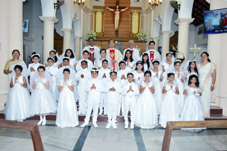  27 children of Valencia Parish received First Holy Communion